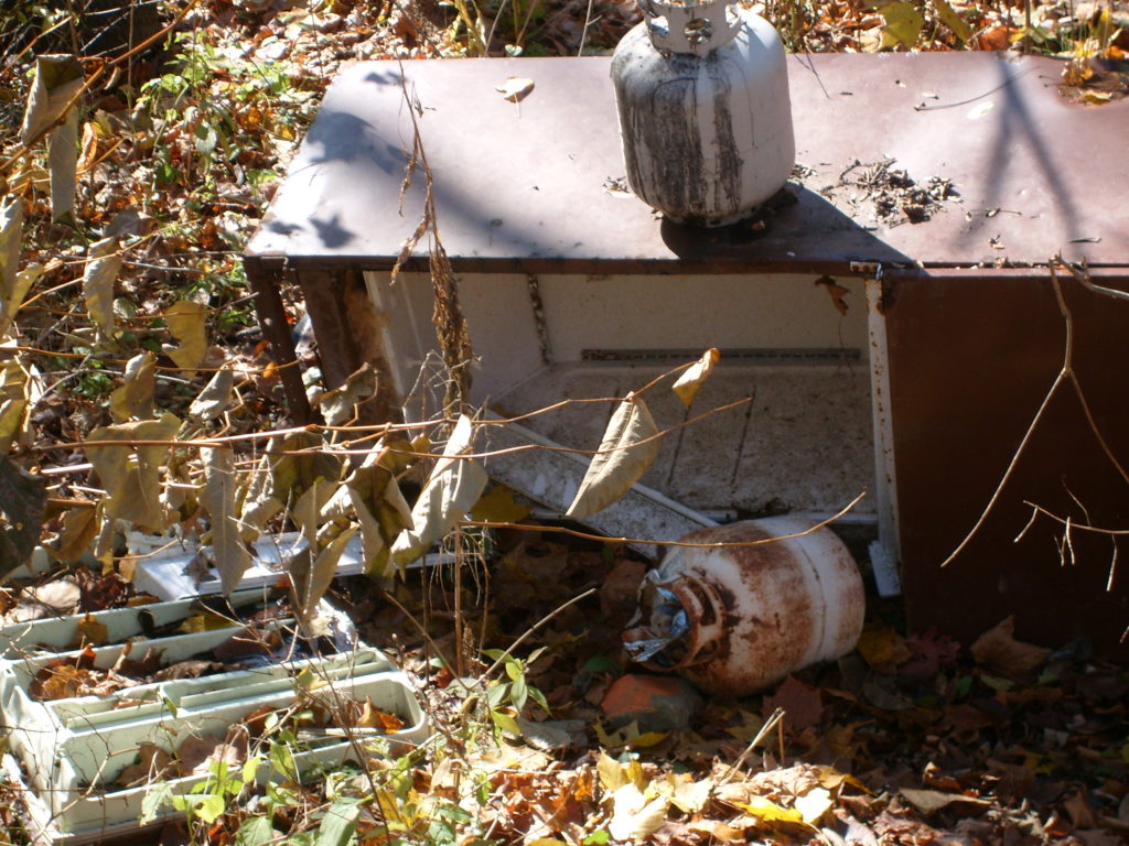 An illegal dump site full of trash