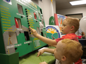 Children using an interactive educational board